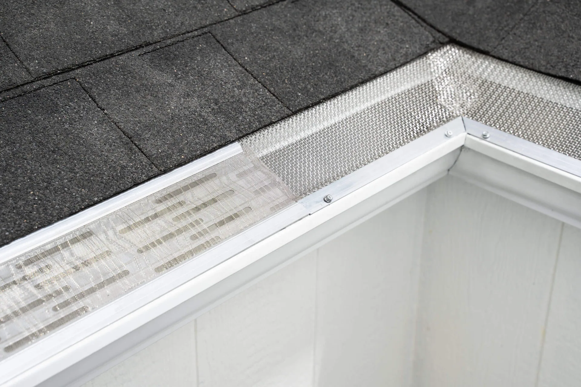 Micro mesh gutter guard outside corner white gutter, Sanford FL